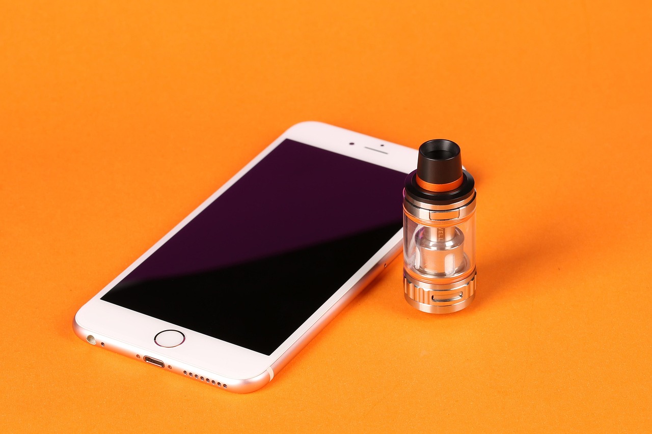 Assorted vape accessories including drip tips, cables and cases
